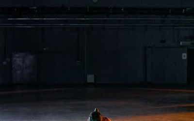 Wide shot of an empty, well-lit training area.